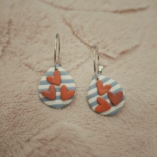 Heart-shaped hoop earrings in hand-painted polymer clay