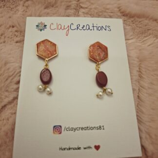 Warm maroon polymer clay earrings with smooth hand-painted finish