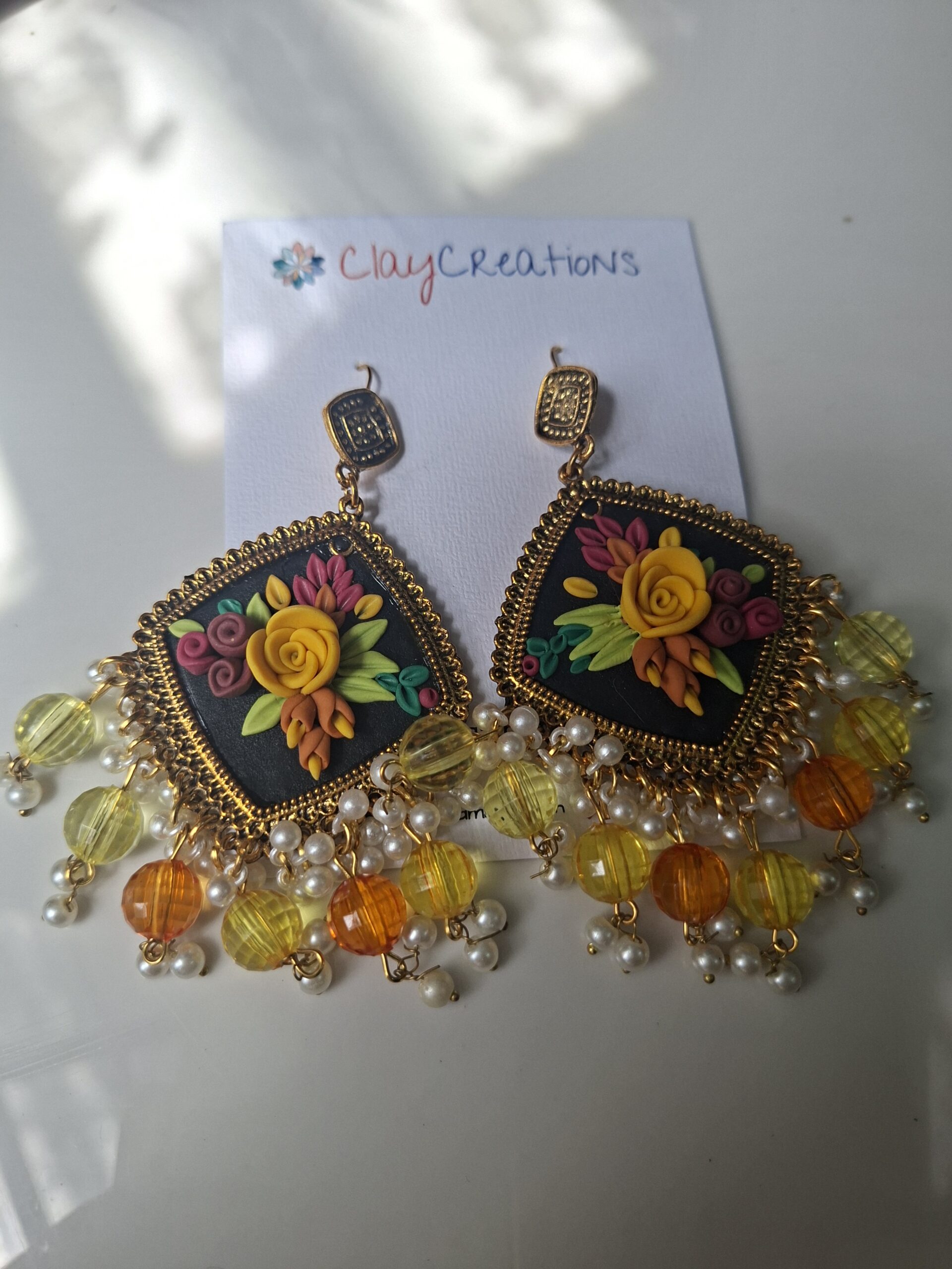 Handcrafted Black Floral Clay Jhumkas with Pearl Danglers | ClayCreations - Image 4