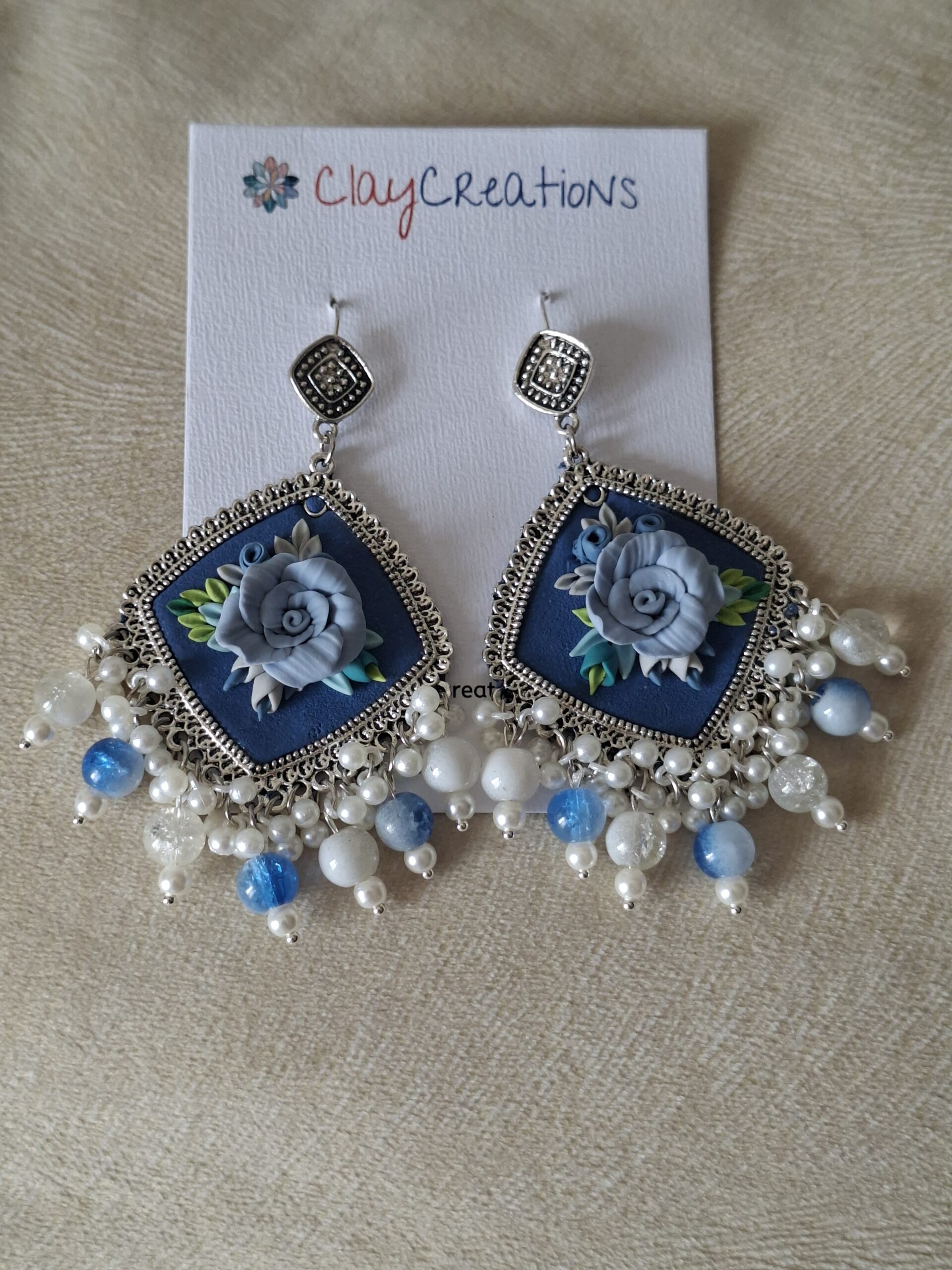 Handcrafted Blue Floral Clay Jhumkas | Traditional Oxidized Silver Ethnic Earrings - Image 5