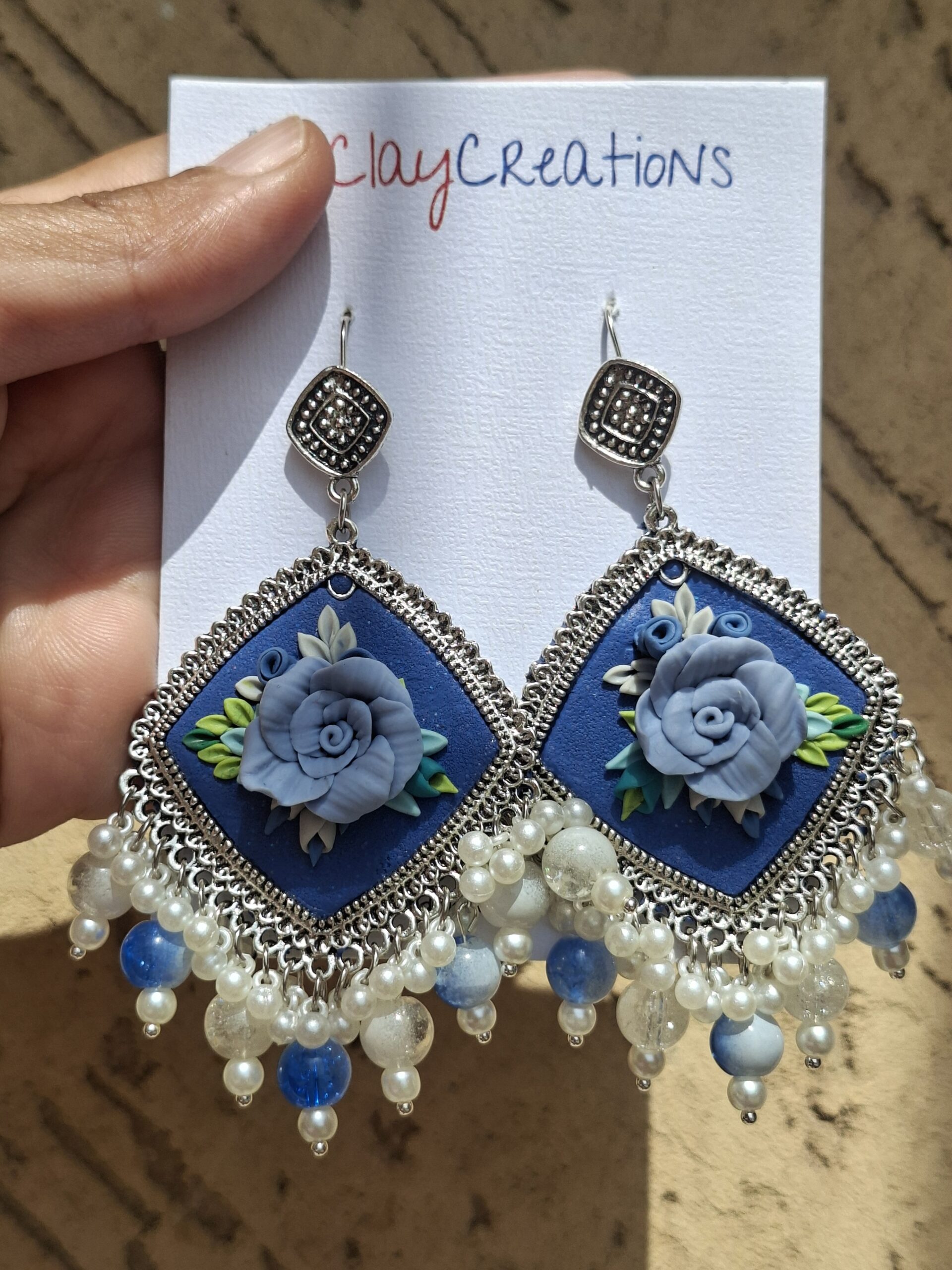 Handcrafted Blue Floral Clay Jhumkas | Traditional Oxidized Silver Ethnic Earrings - Image 4
