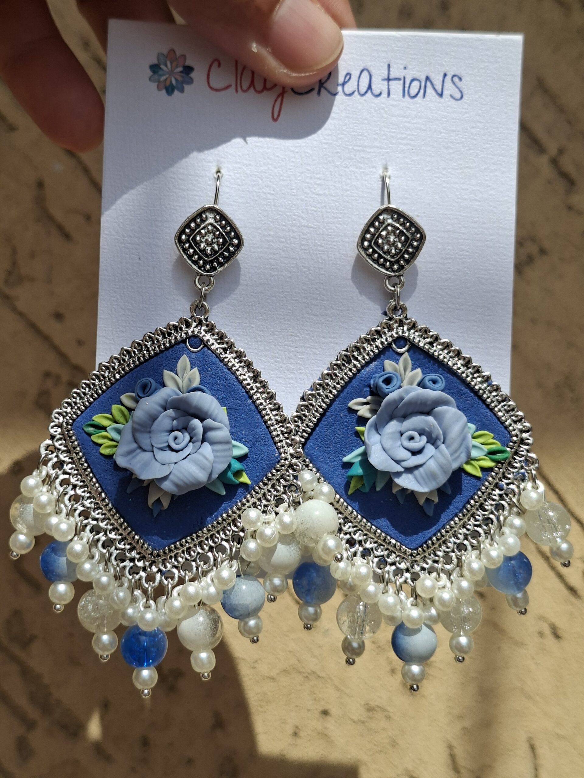 Handcrafted Blue Floral Clay Jhumkas | Traditional Oxidized Silver Ethnic Earrings - Image 2