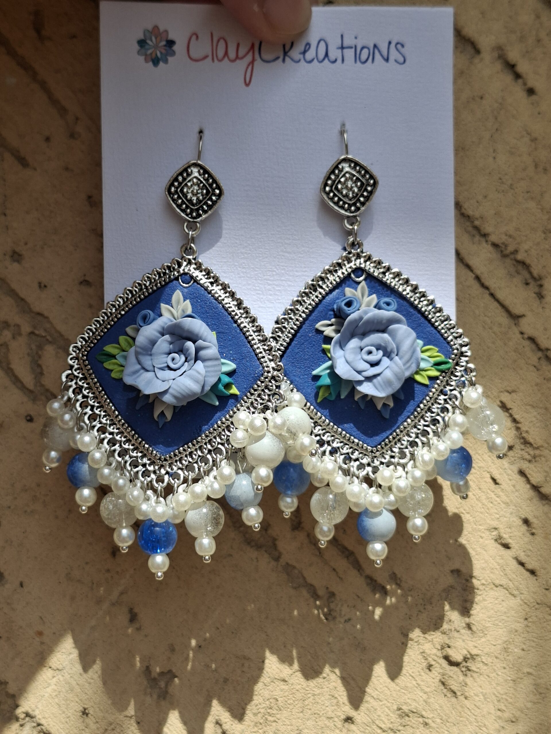 Handcrafted Blue Floral Clay Jhumkas | Traditional Oxidized Silver Ethnic Earrings - Image 3